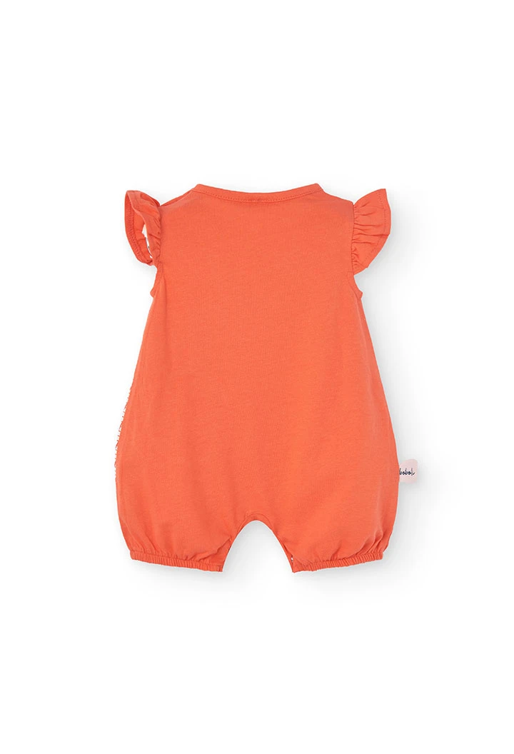 Red knit playsuit for baby girl with ladybird design