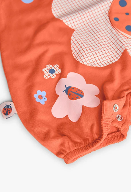 Pagliaccetto in maglia per neonata in colore rosso con design di coccinella.