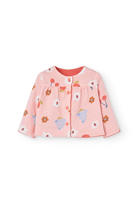 Veste en maille réversible pour bébé fille en rouge et rose.