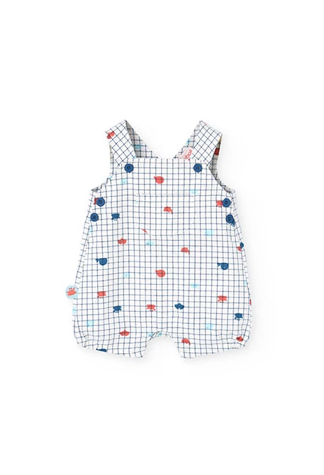 Salopette in popeline per bambino in colore bianco con stampa a quadri in blu e rosso.