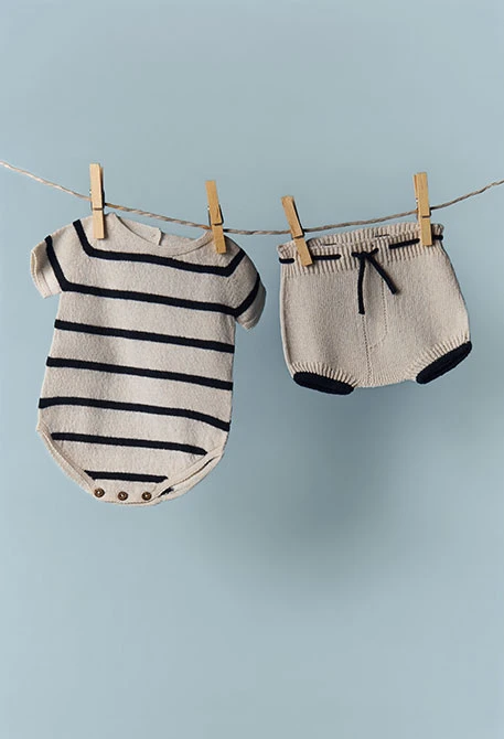 Tutina neonato in maglia a righe filato 100% riciclato