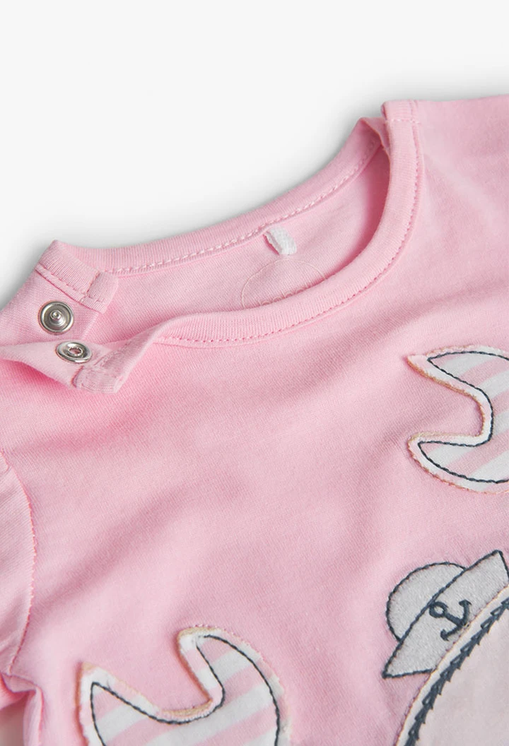 Grenouillère tricotée en rose pour bébé