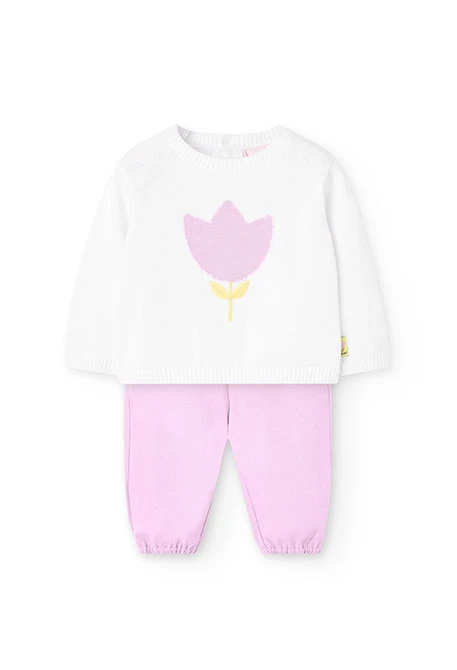 Ensemble en maille pour bébé fille en blanc et rose avec motif.