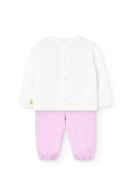 Ensemble en maille pour bébé fille en blanc et rose avec motif.