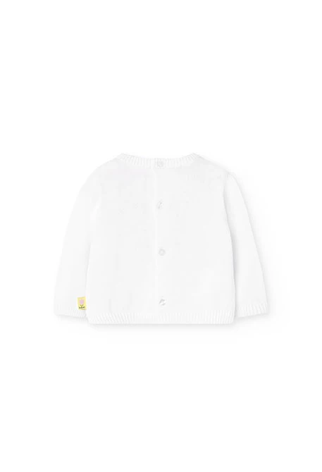 Ensemble en maille pour bébé fille en blanc et rose avec motif.