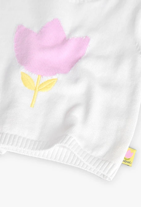 Ensemble en maille pour bébé fille en blanc et rose avec motif.