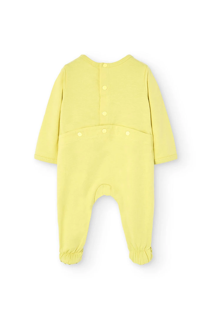 Combinaison en tricot pour bébé garçon de couleur verte.