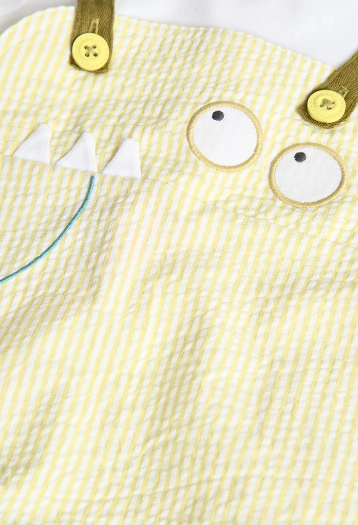 Pagliaccetto in popeline per neonato a righe di colore giallo.