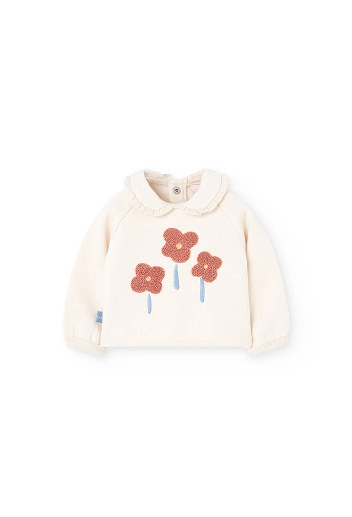Ensemble bébé en tricot écru avec fleurs