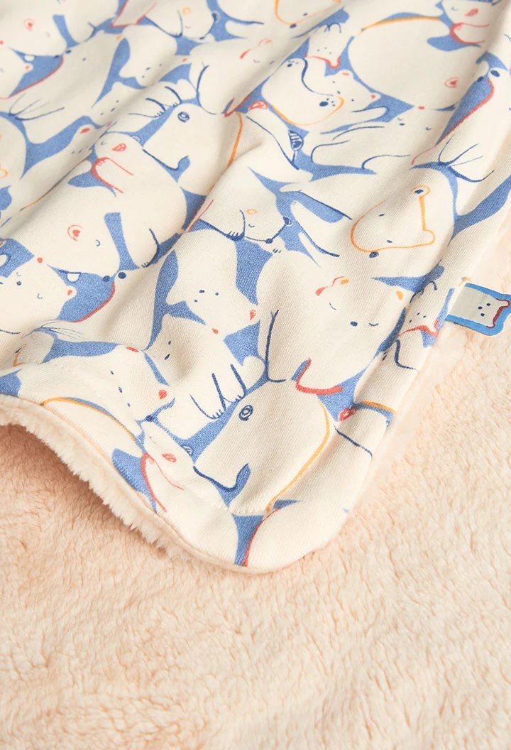 Baby blanket in printed blue and beige animal fleece.