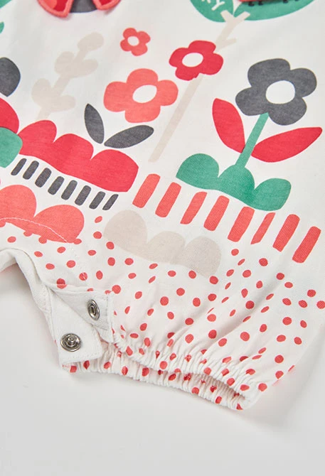 White cotton baby sleepsuit