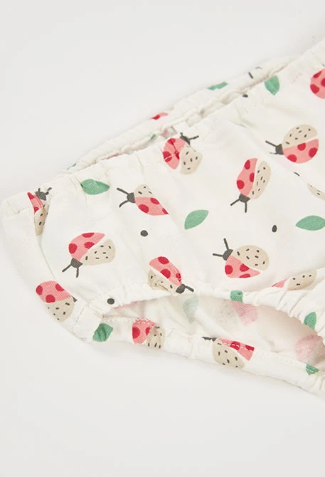 Kleid für Baby aus Strick mit Druckmuster