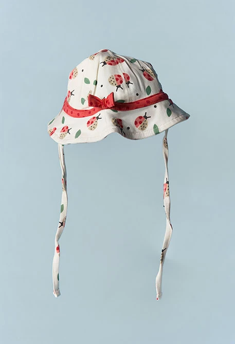Cappellino neonato in cotone stampato