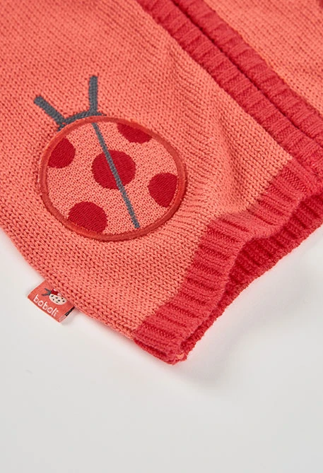 Veste en tricot rose pour bébé