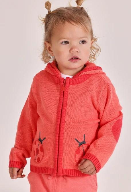 Veste en tricot rose pour bébé