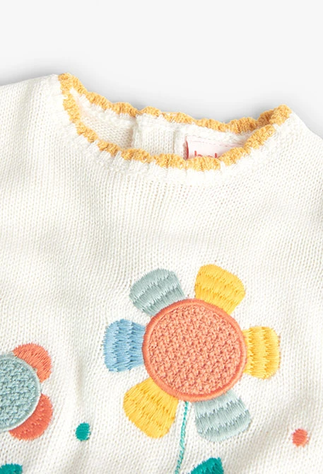 Vestido tricotosa para bebé niña en blanco con estampado de flores
