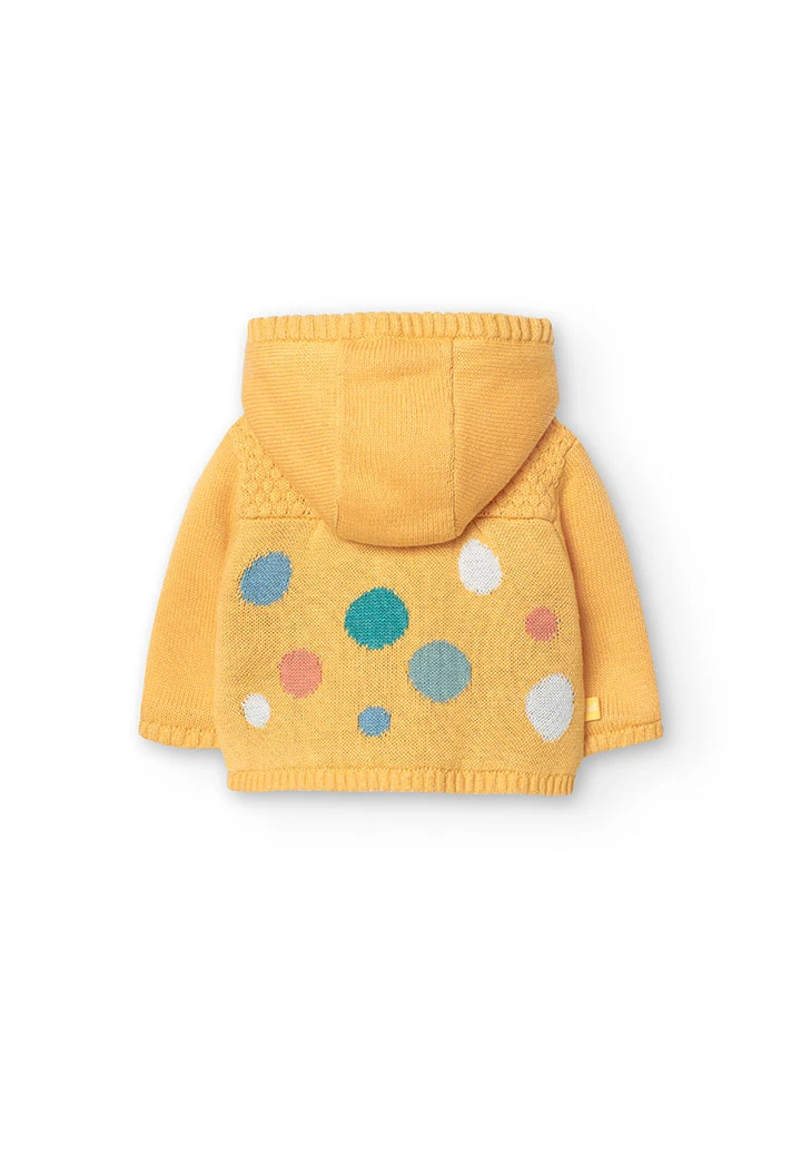 Knitted jacket for baby girl in yellow colour