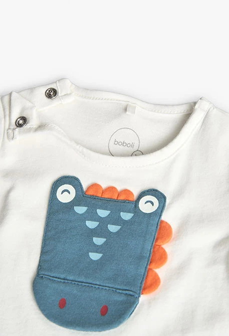 Baby boy knitted romper in white with dinosaur design