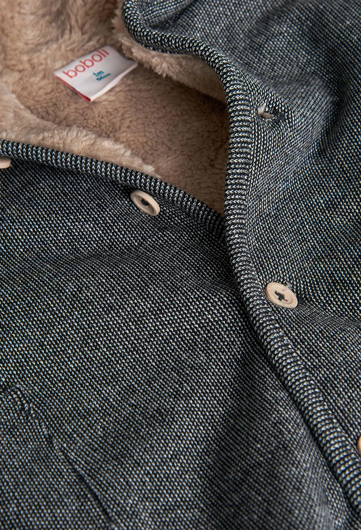 Combinaison en tricot gris pour bébé