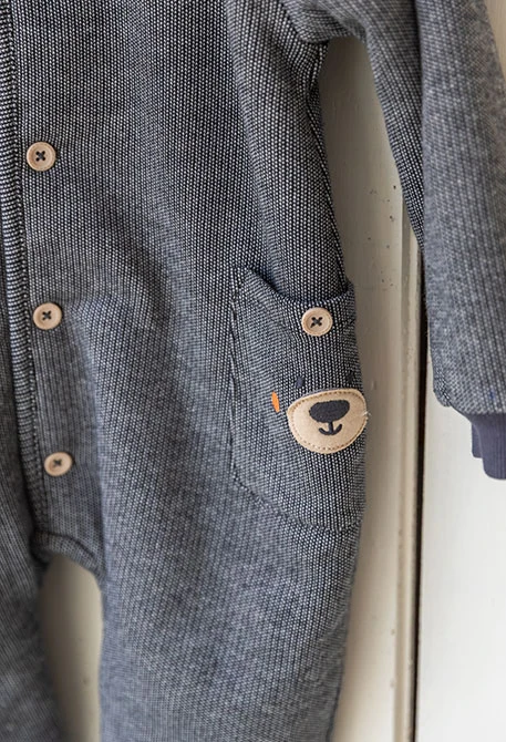 Grey knitted baby sleepsuit