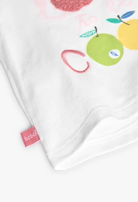 Set coordinato con maglietta e pantaloni in maglia per bambina in colore bianco.