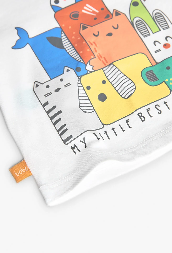 Set di maglietta e pantaloni in maglia per neonato di colore bianco.