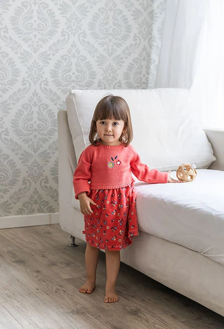 Robe bébé rose avec fleurs