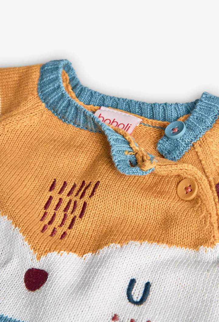 Yellow knitted baby jumper
