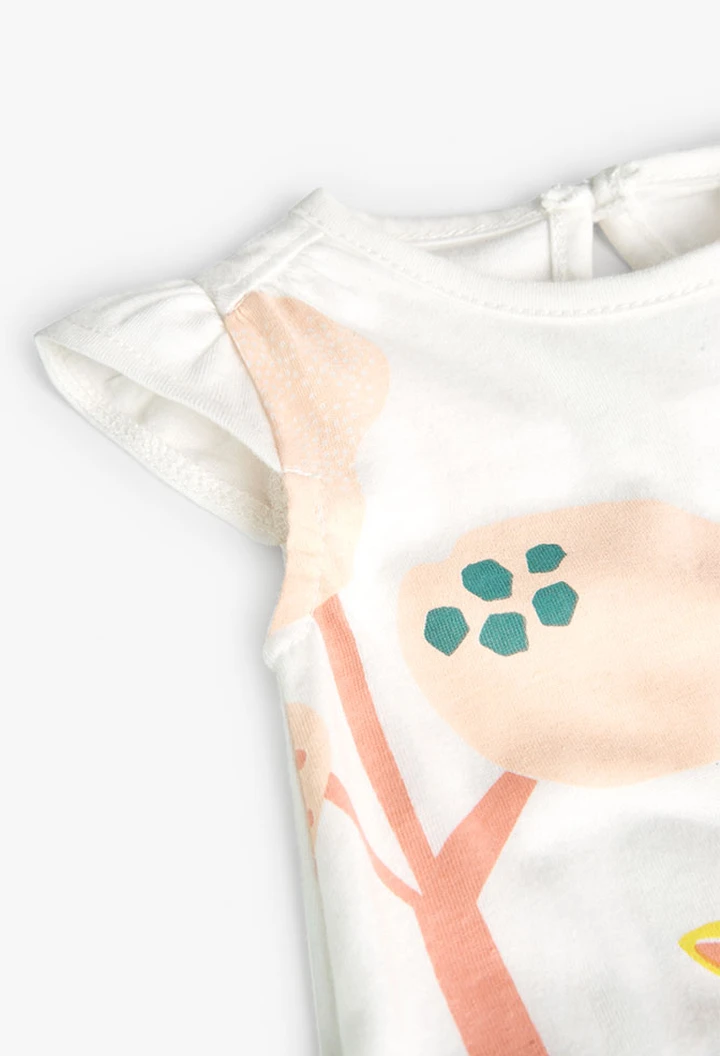 Grenouillère tricotée pour bébé fille en blanc