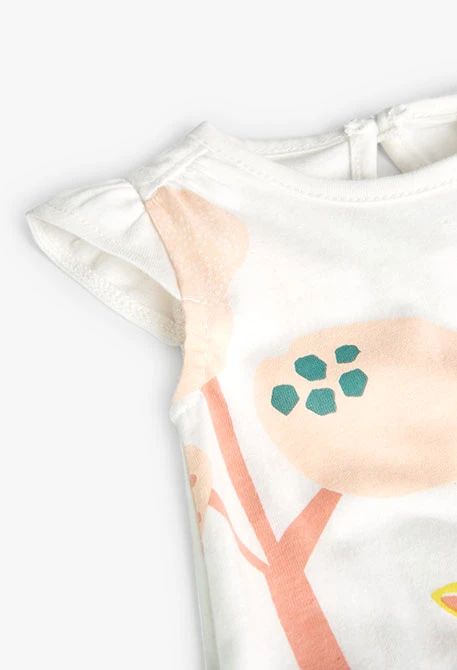 Grenouillère tricotée pour bébé fille en blanc