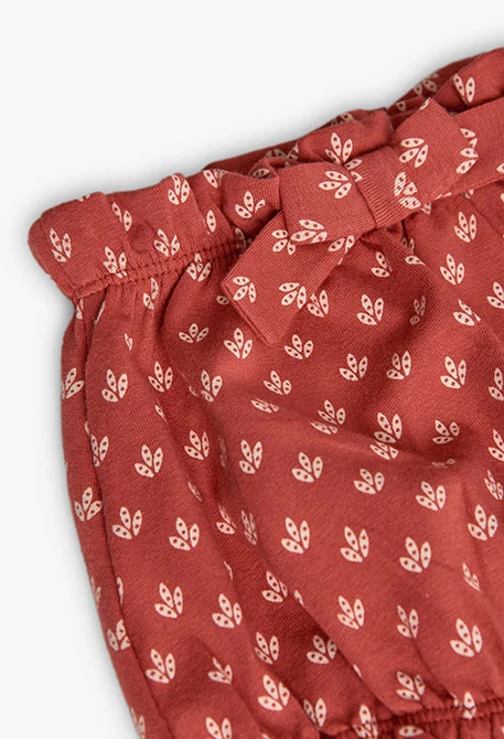 Conjunto de punto para bebé niña con estampado de flores en color rojo