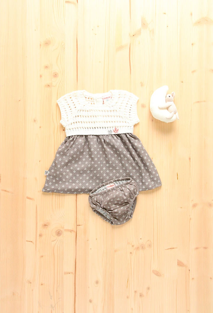 Baby girl's white knitted dress