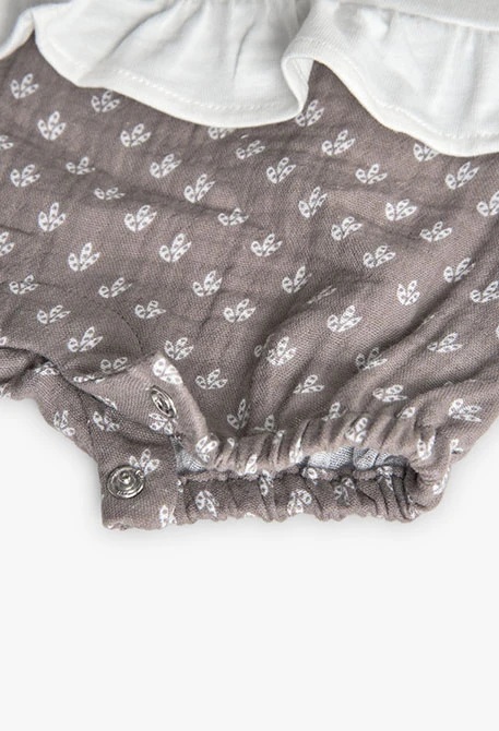 Tutina in maglia per neonata in bianco combinato