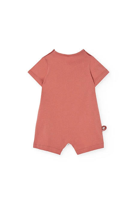 Tutina corta in maglia per bebé di colore arancione.