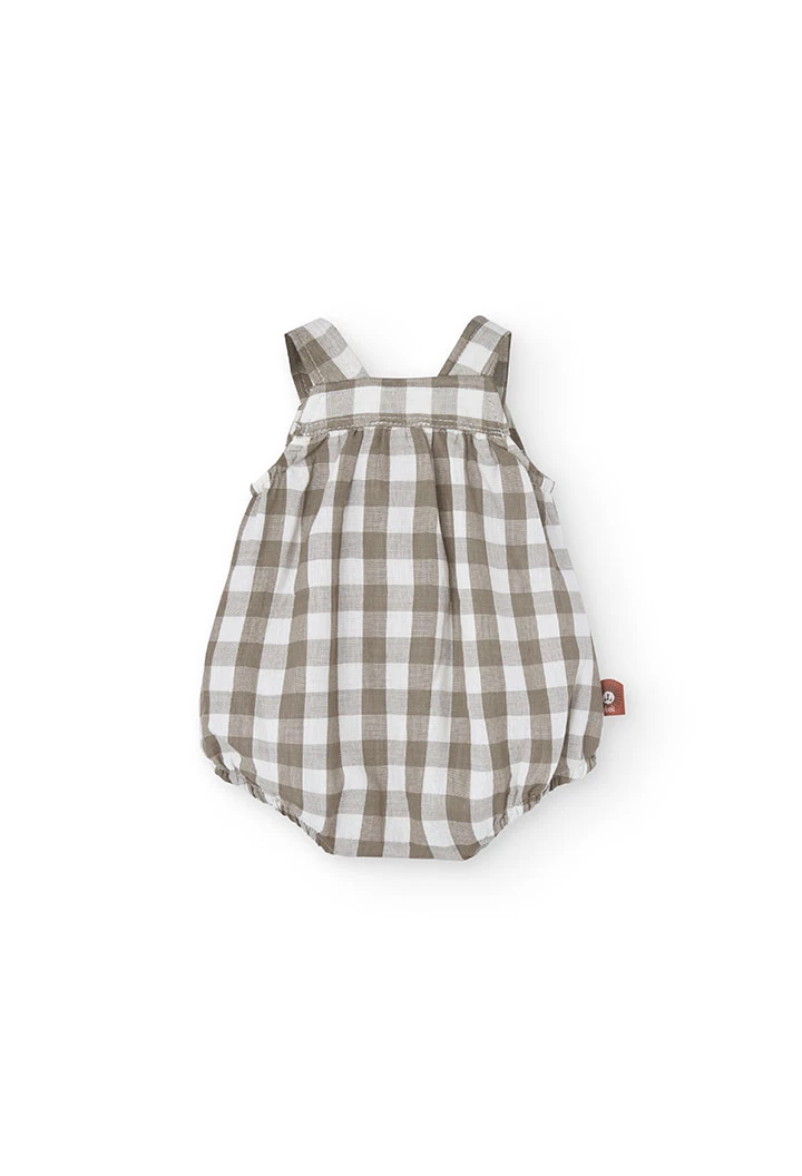 Tutina in maglia per bebé a quadri nei toni della terra.