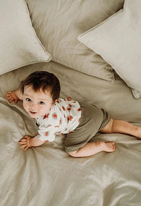 Baby boy knitted set with printed T-shirt and shorts in light and brown colours