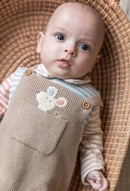 Cream knit baby bodysuit