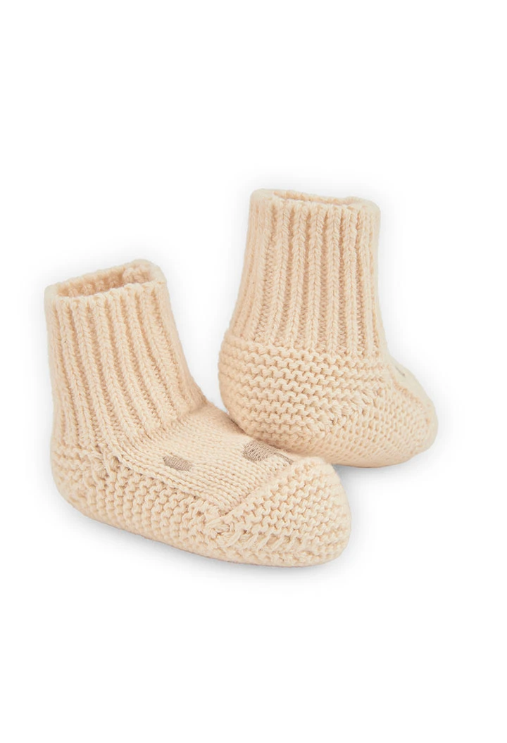 Knitted baby booties hedgehogs