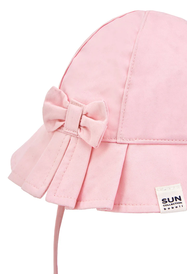 Bonnet tricoté pour bébé en rose