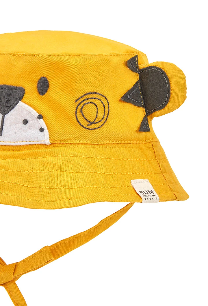 Bonnet en sergé bébé en jaune