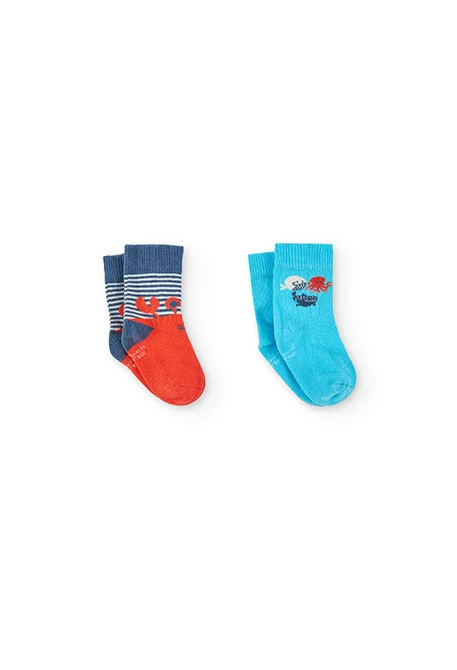 Babypack mit Stricksocken in Blau