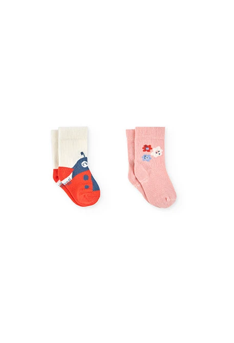 Pack of knitted baby socks in pink.