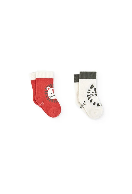 Confezione di calzini a maglia per bambino in colore arancione.