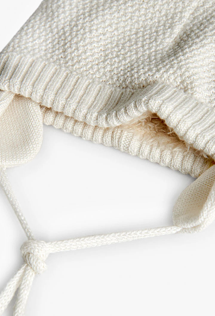 Bonnet bébé blanc avec pompons