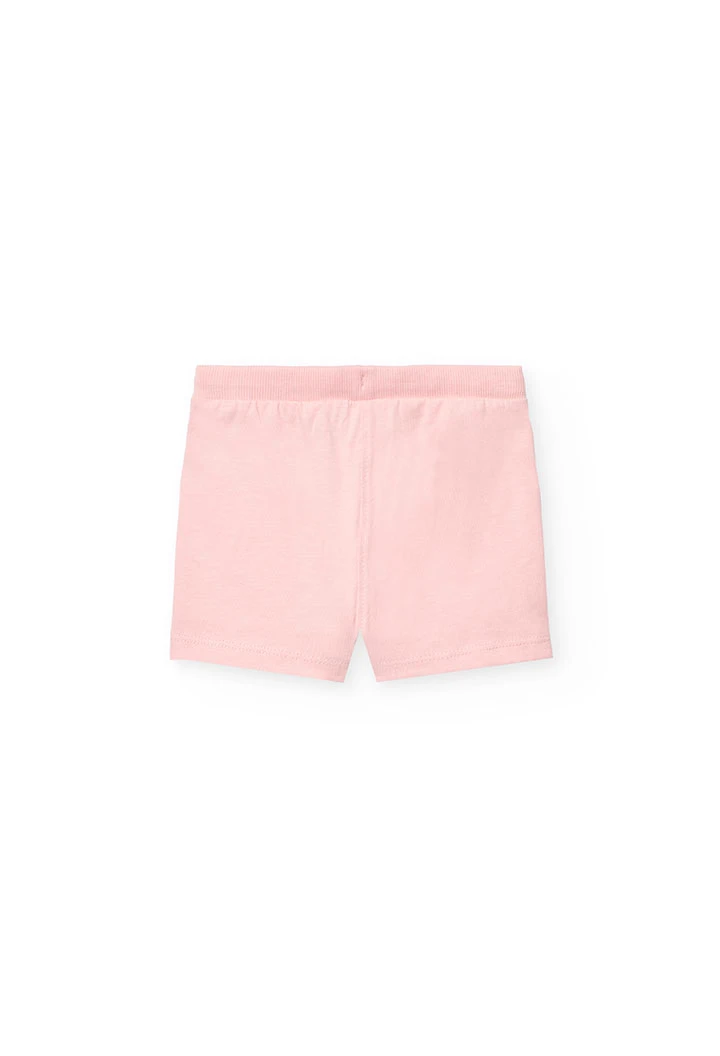 Set di maglietta e pantaloncini in maglia per neonata nei colori blu navy e rosa.