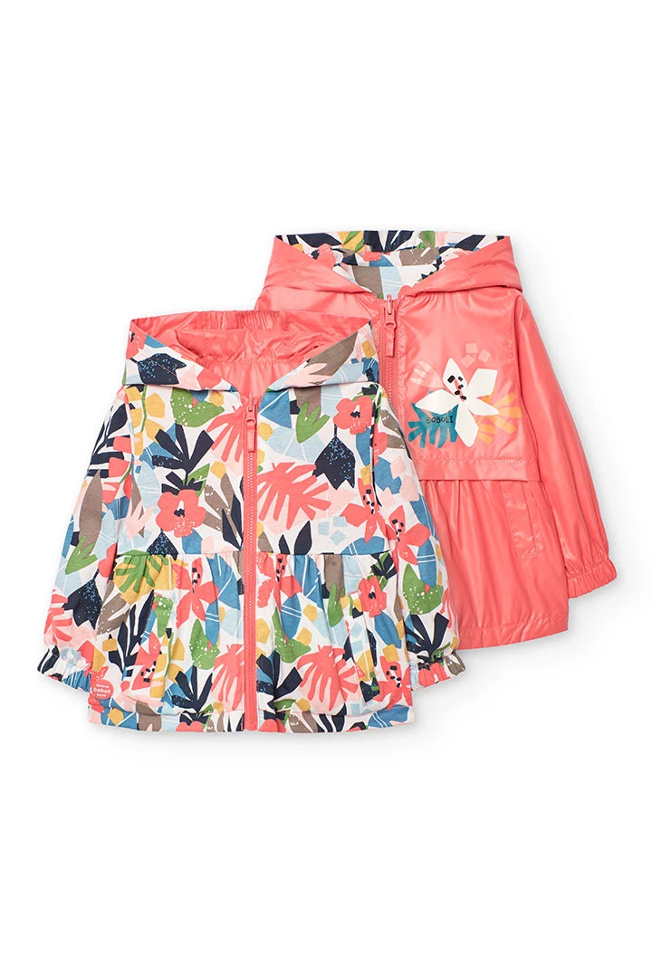 Parka reversibile per bambina in colore rosso.