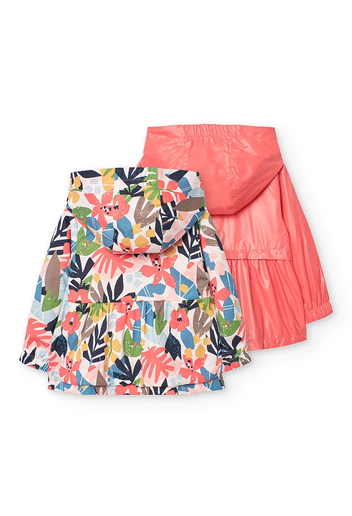 Parka reversibile per bambina in colore rosso.