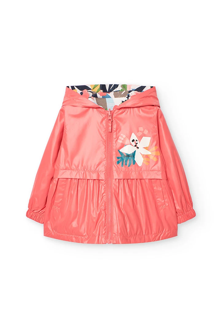 Parka reversibile per bambina in colore rosso.