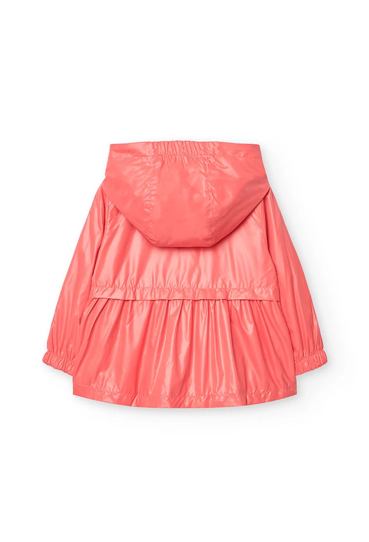 Parka reversibile per bambina in colore rosso.