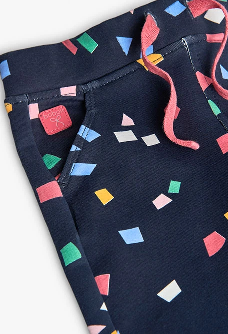 Pantalon fille en molleton motifs géométriques